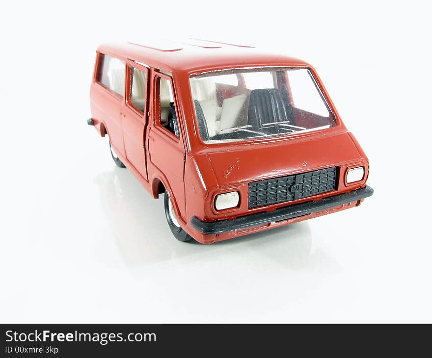 Model of the red car on a white background. Model of the red car on a white background