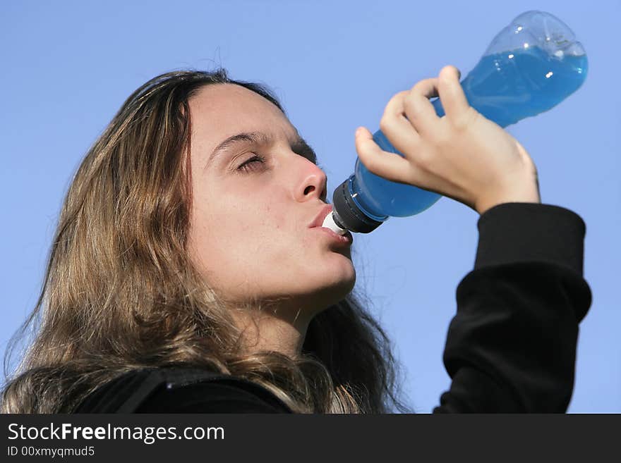 Girl drinking an energetic drink