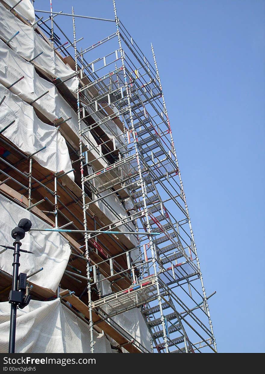 Overview of building site as construction taking place.