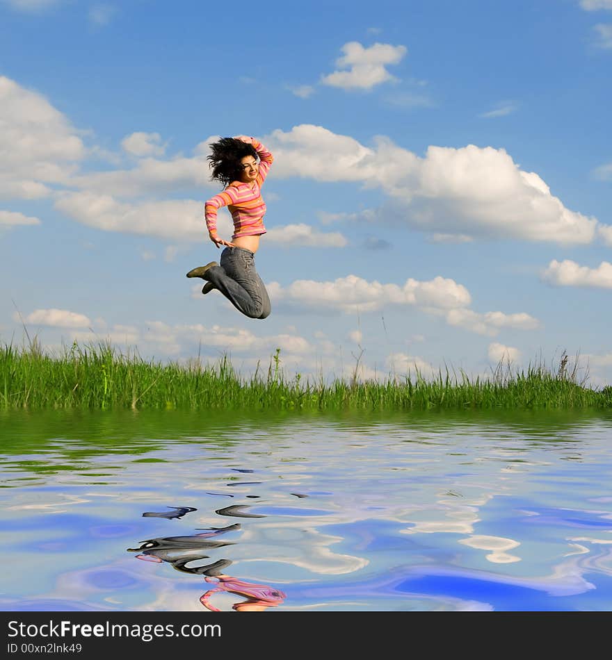 Pretty young woman is jumping