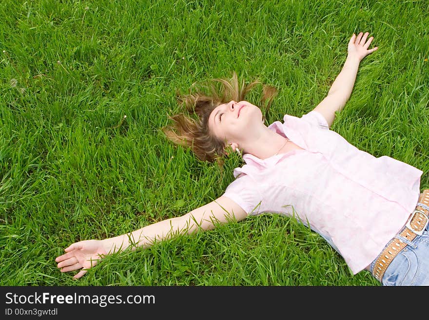 Sweet woman rest on the grass