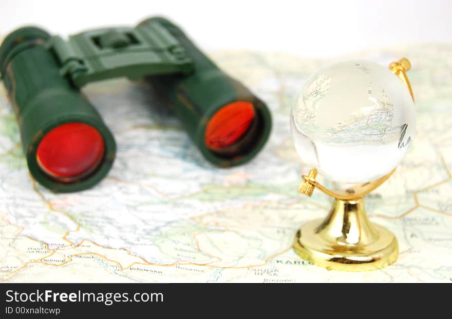 Military binoculars, globe and map. Military binoculars, globe and map