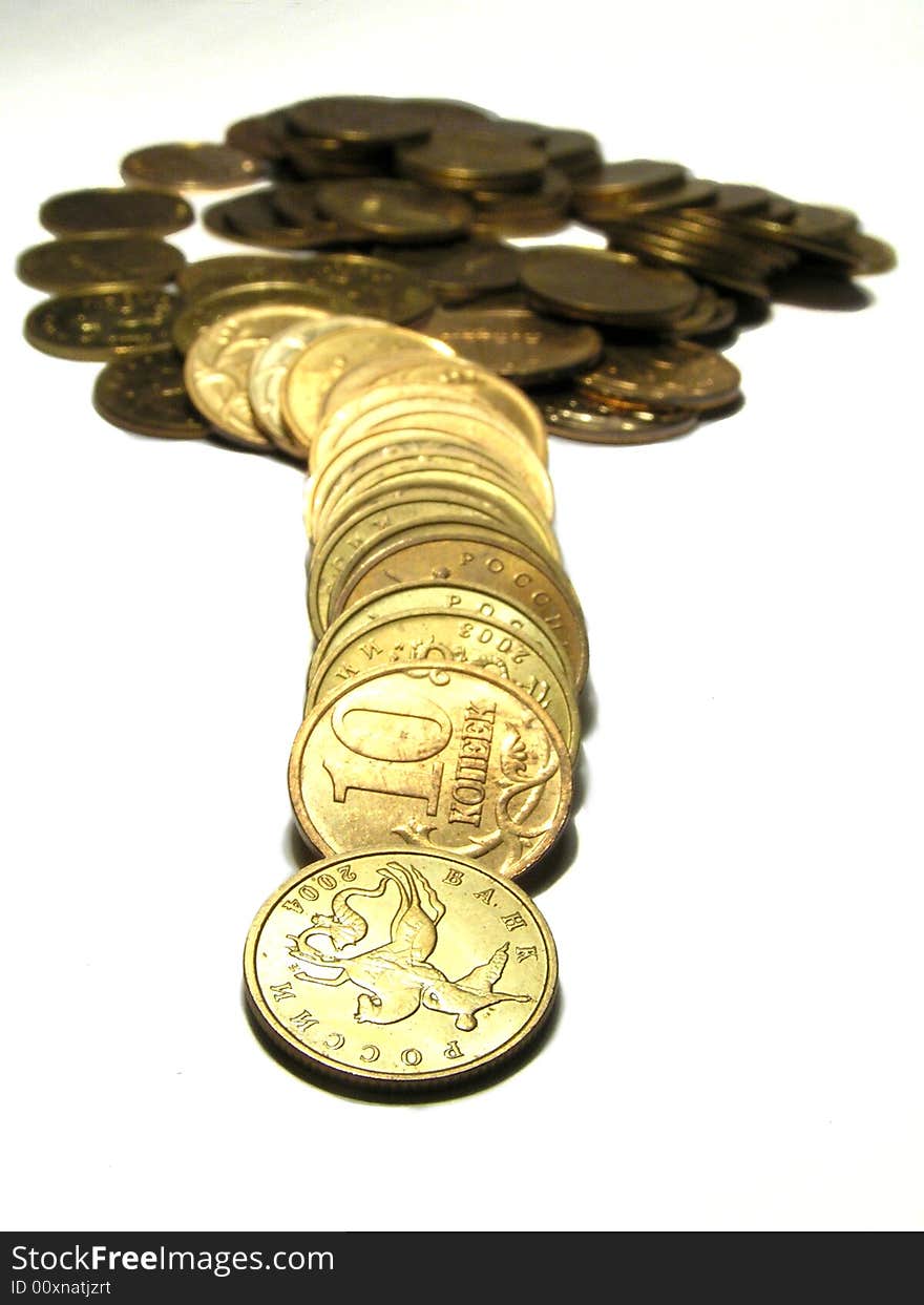 Scattering of coins of bank of Russia on a white background with coins on a background