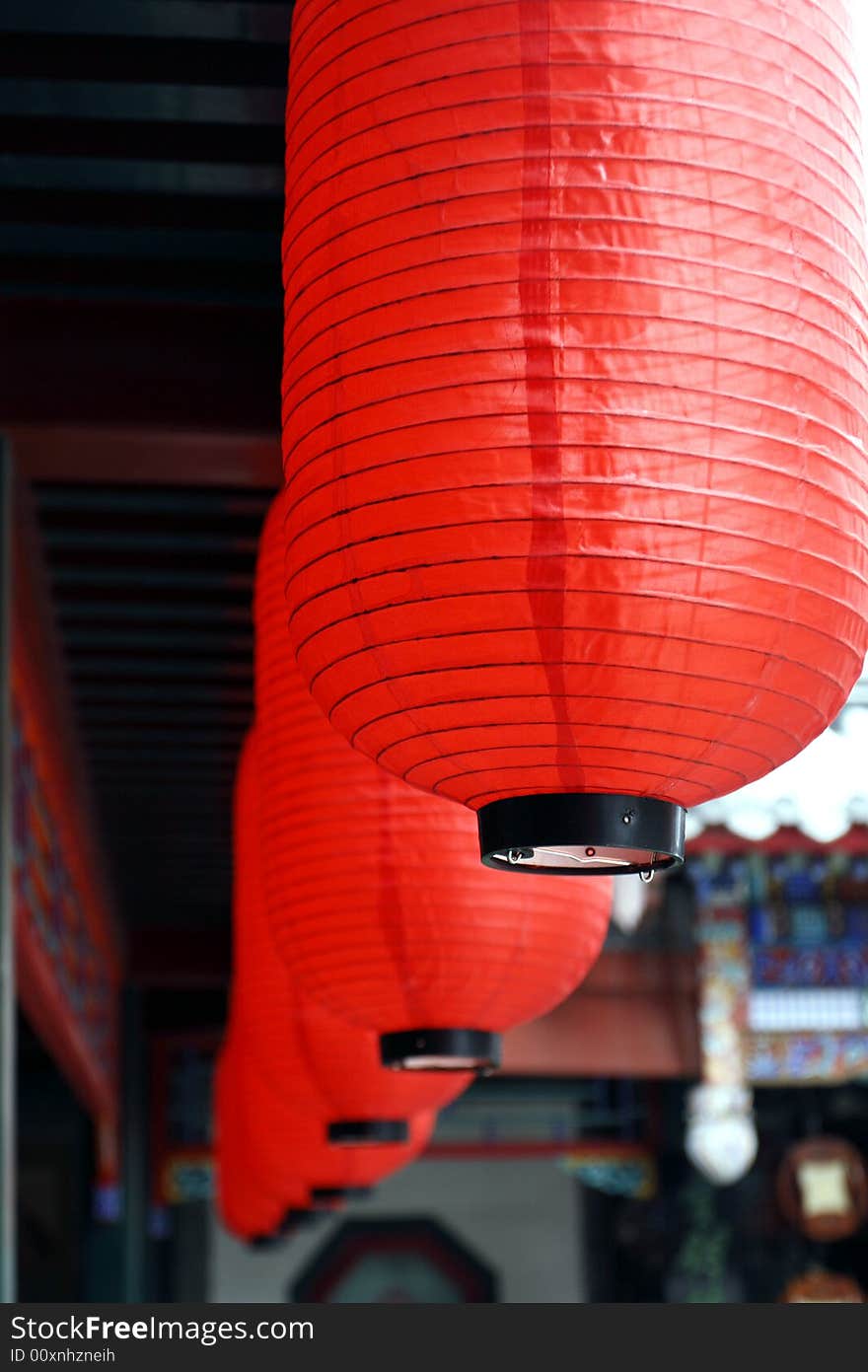 Red lantern hung on the Chinese ancient building. Its implied meaning is joyous, happy and lucky. Red lantern hung on the Chinese ancient building. Its implied meaning is joyous, happy and lucky.