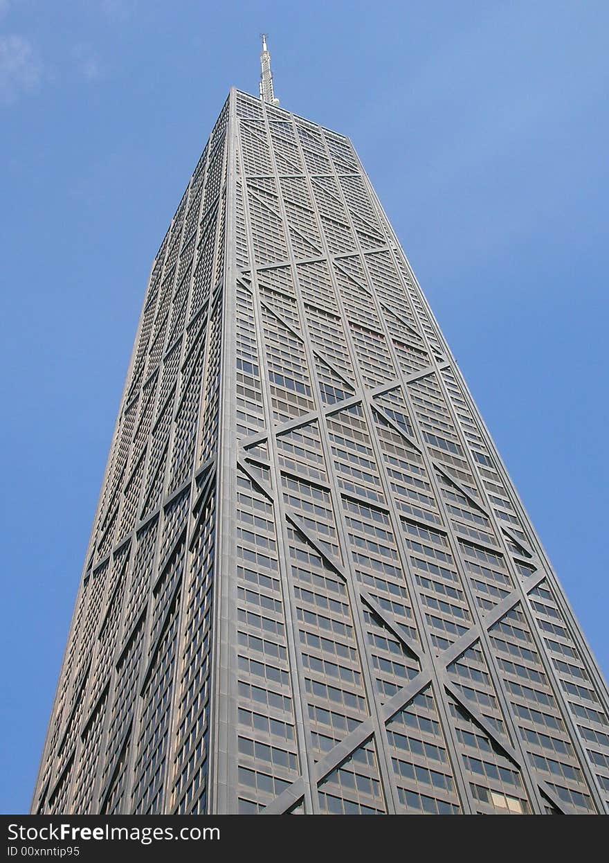 Looking up at the John Hancock 
Building. Looking up at the John Hancock 
Building.