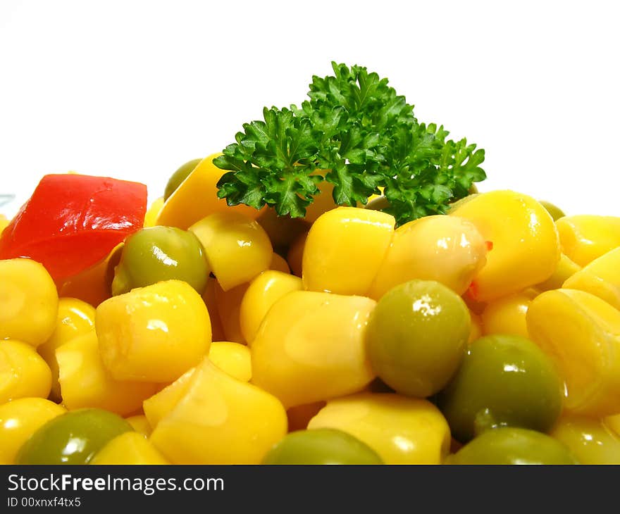 Detail fresh vegetable salad with peas, corn and paprika