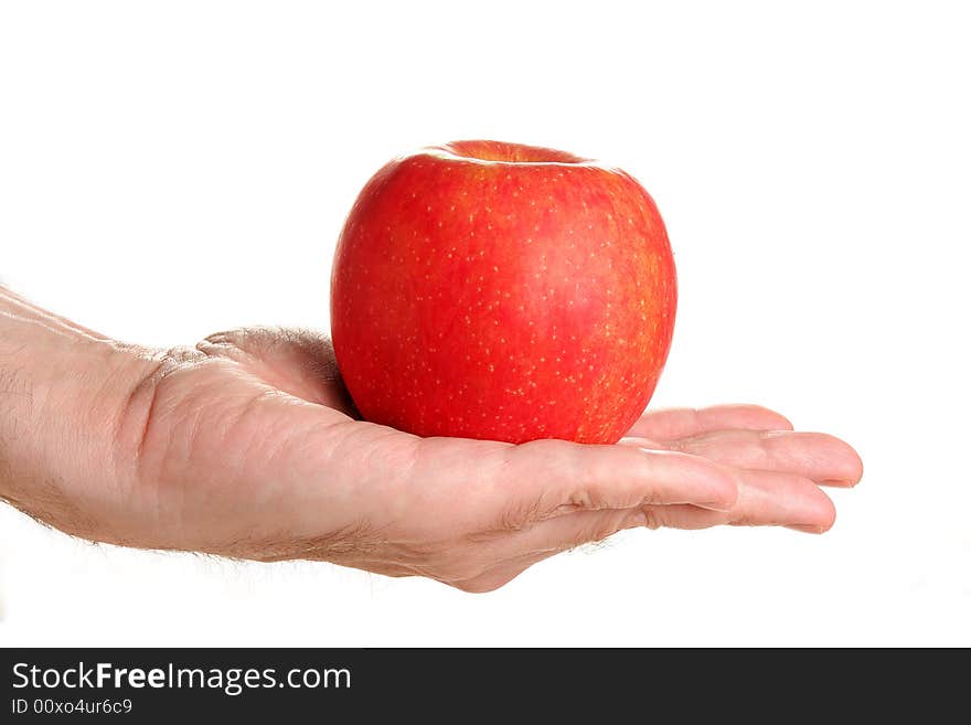 Man holding delicious red apple, isolated on white