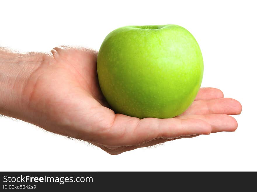 Man holding delicious green apple, isolated on white