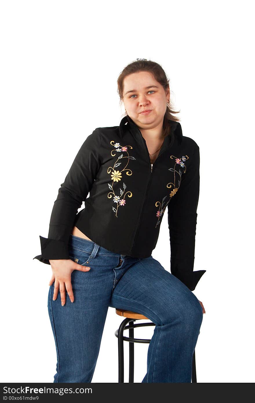 Girls posing sitting on stool