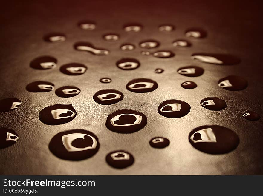 Drops of the water on a book cover. Drops of the water on a book cover