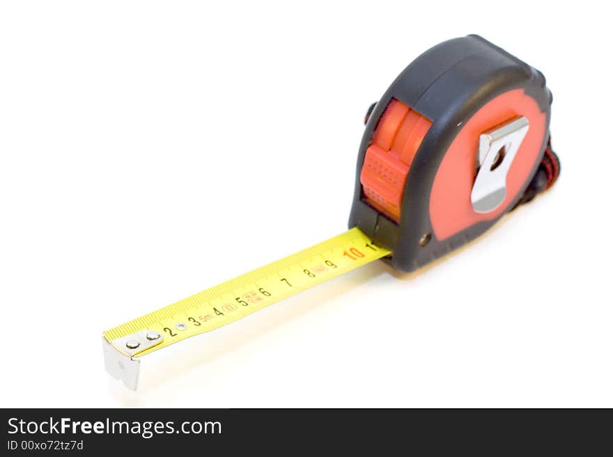 Tape-measure on the white background