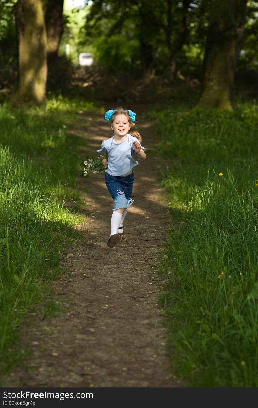 Girl running on a lane. Girl running on a lane