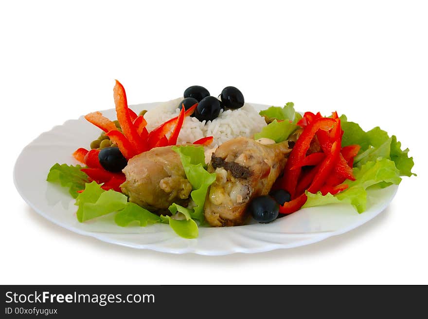 Rice and fried chicken with vegetable (lettuce, pepper,  olives and green peas) decoration. Rice and fried chicken with vegetable (lettuce, pepper,  olives and green peas) decoration.