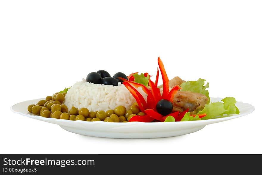 Rice and fried chicken with vegetable (lettuce, pepper,  olives and green peas) decoration. Rice and fried chicken with vegetable (lettuce, pepper,  olives and green peas) decoration.