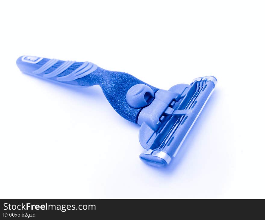 Blue razor.
Object over white.