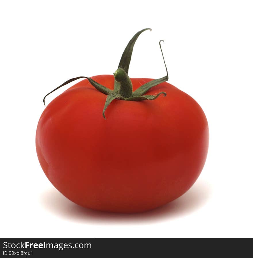 Fresh red tomato on white background