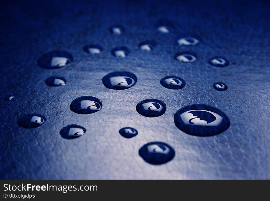 Drops of water on a cover to the book. Drops of water on a cover to the book