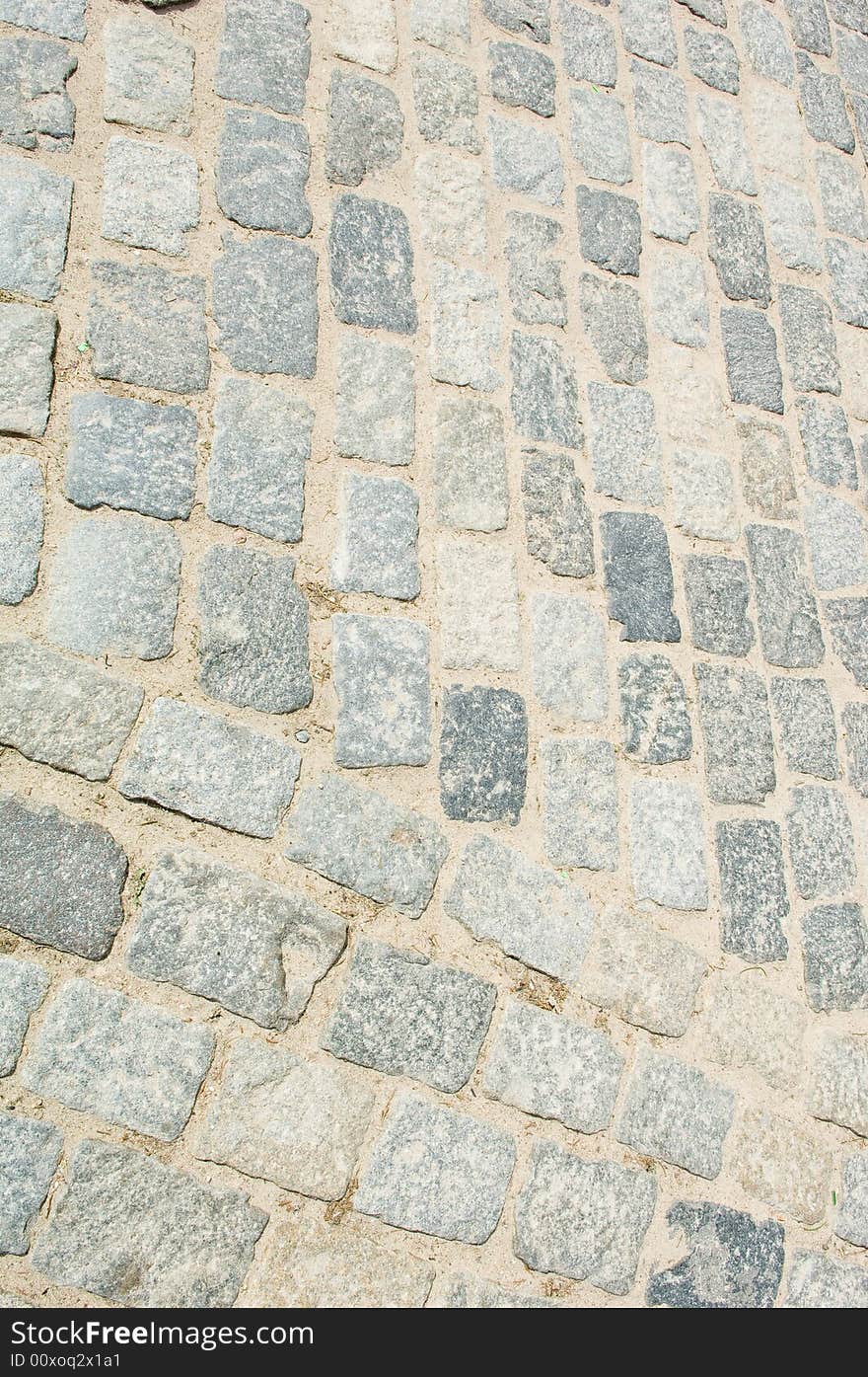 Light stone roadway street texture. Light stone roadway street texture