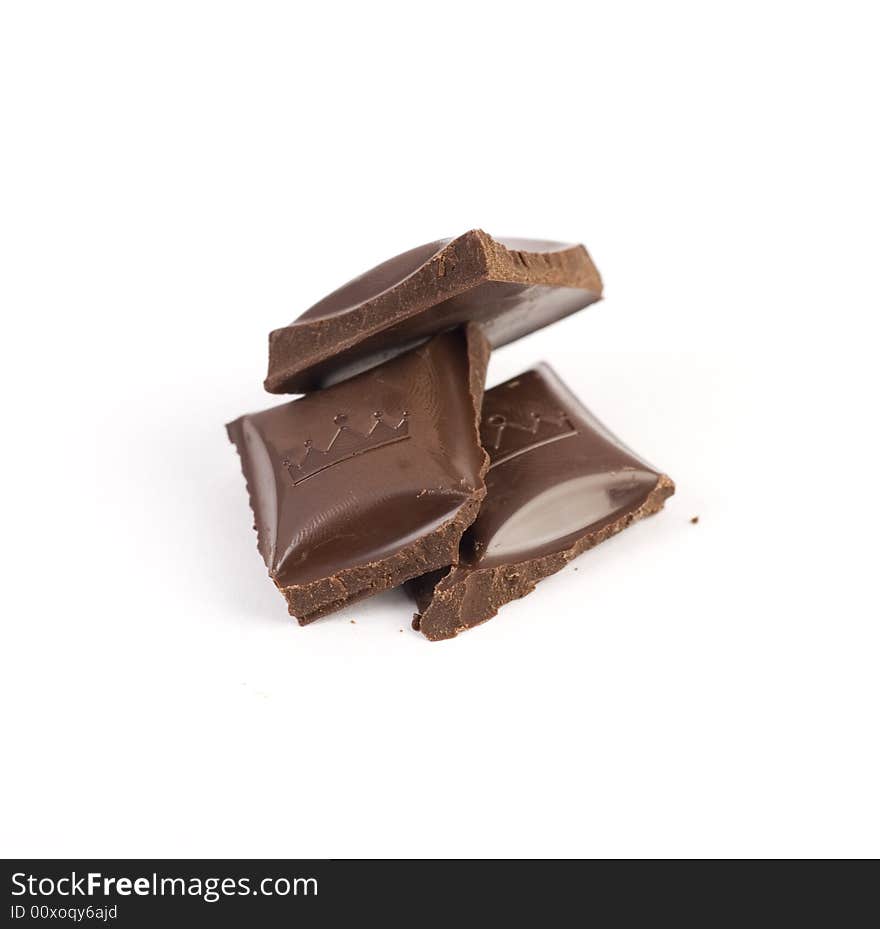 Sweet brown milk chocolate at white background. Sweet brown milk chocolate at white background