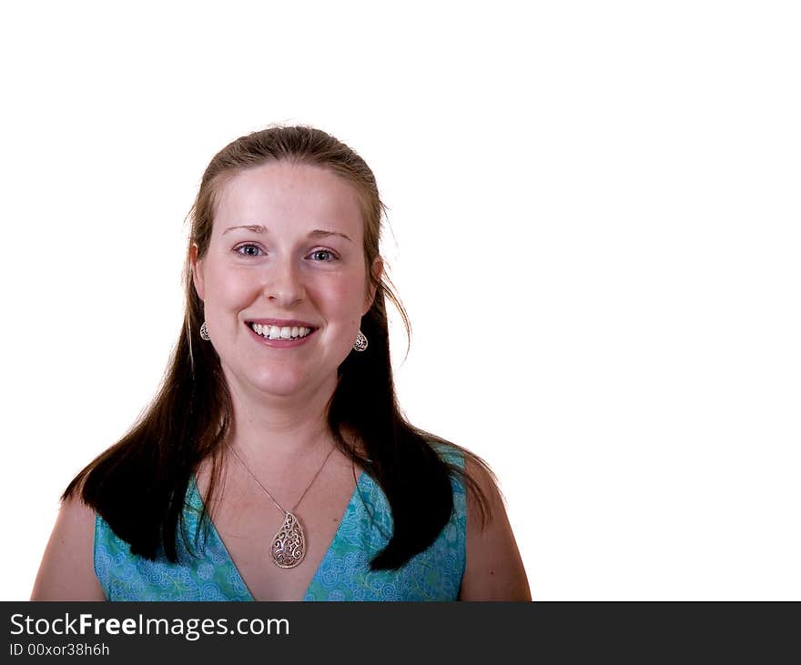 A nice young woman in a teal dress smiling on a white background. A nice young woman in a teal dress smiling on a white background