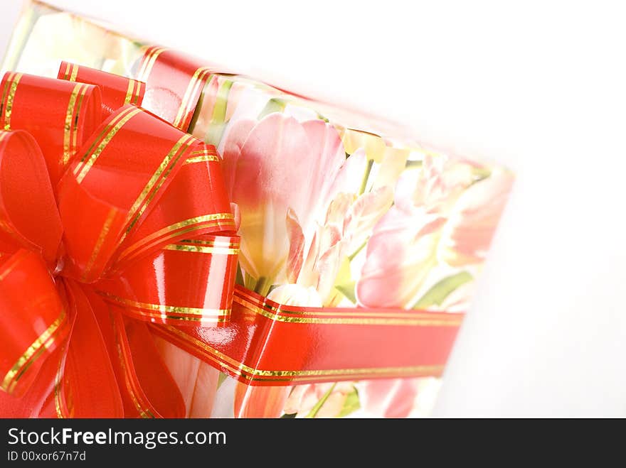 Gift box with red bow at white background. Gift box with red bow at white background