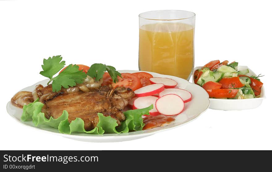 Pork chop with a bow, tomatoes, garden radish and sauce. Pork chop with a bow, tomatoes, garden radish and sauce