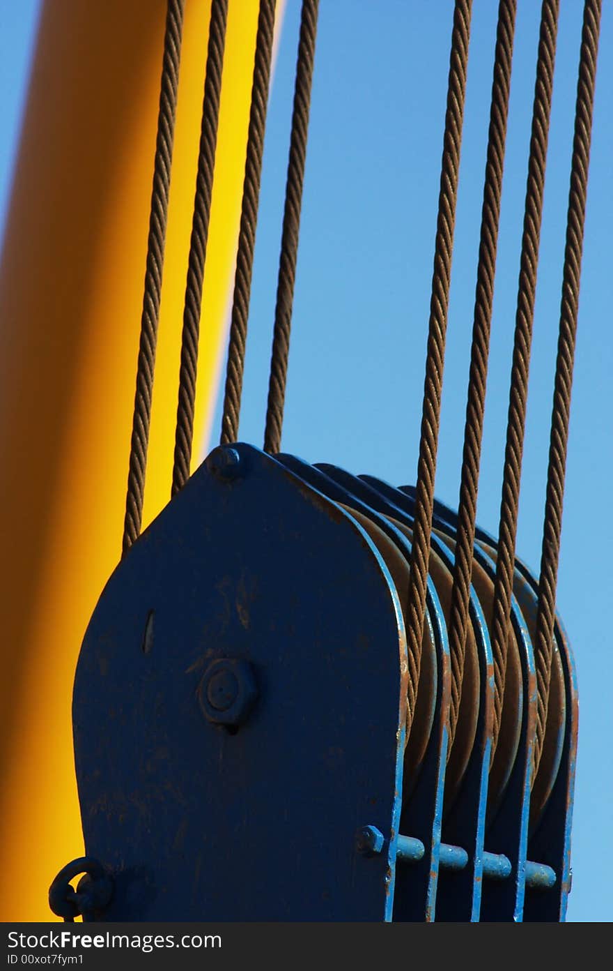 Pulley with steel cables of a sheerlegs. Pulley with steel cables of a sheerlegs