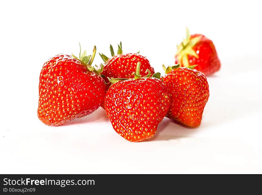 Five strawberries on the whit background. Five strawberries on the whit background