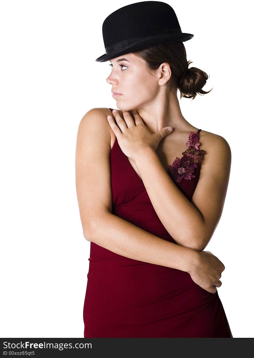 Beautiful young woman wearing an old fashion bowler hat and a red evening gown