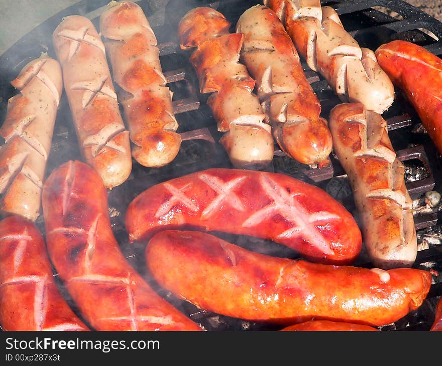 Grilled sausage barbecue with smoke