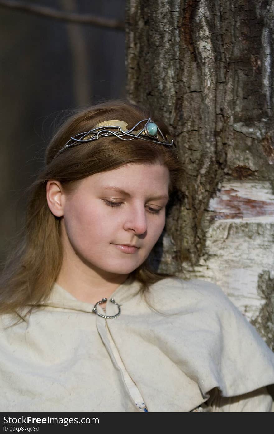 Portrait of the romantic girl in autumn forest. Portrait of the romantic girl in autumn forest