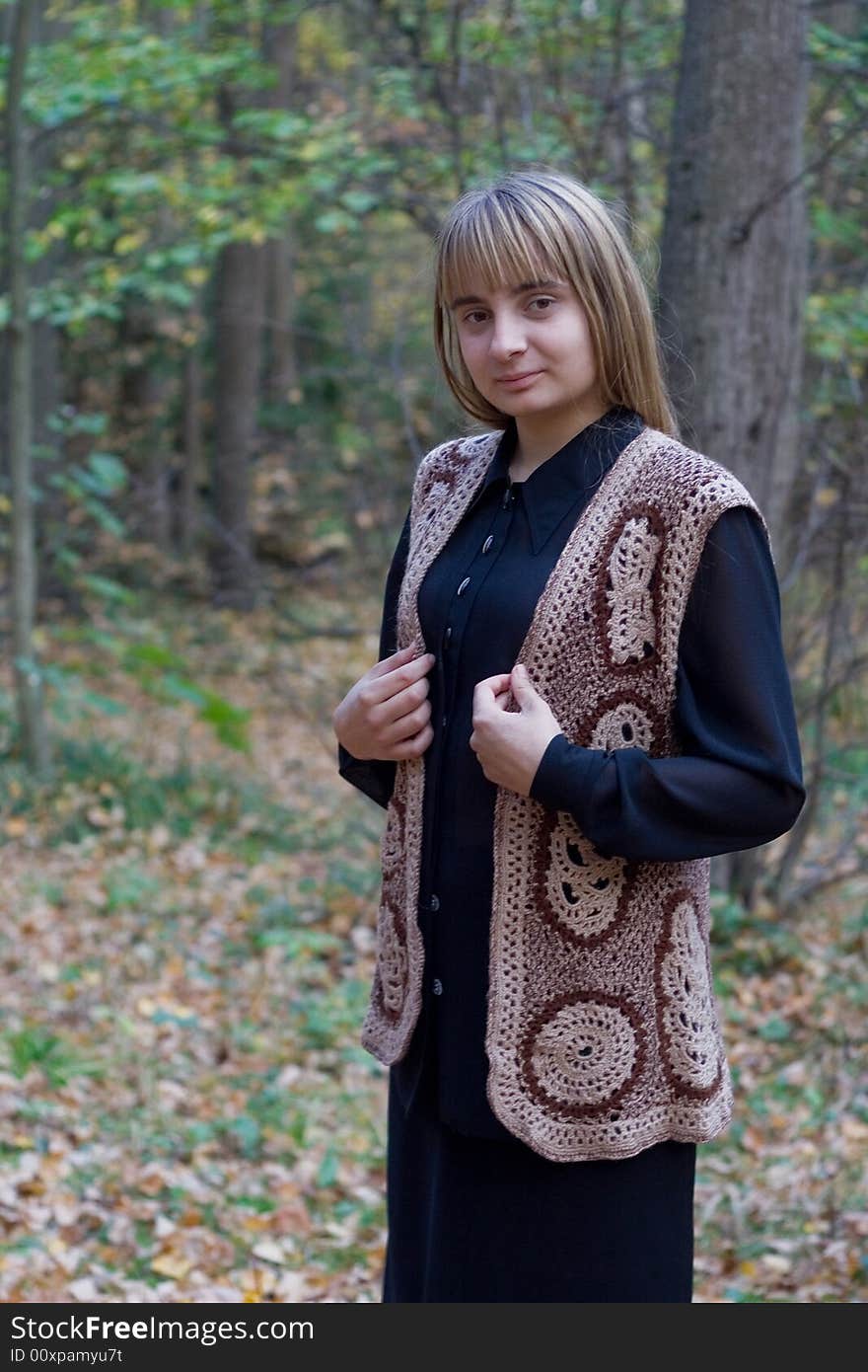 Portrait of the beautiful girl in autumn forest. Portrait of the beautiful girl in autumn forest.