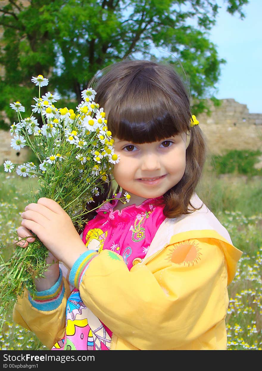 Little girl with a bouquet.