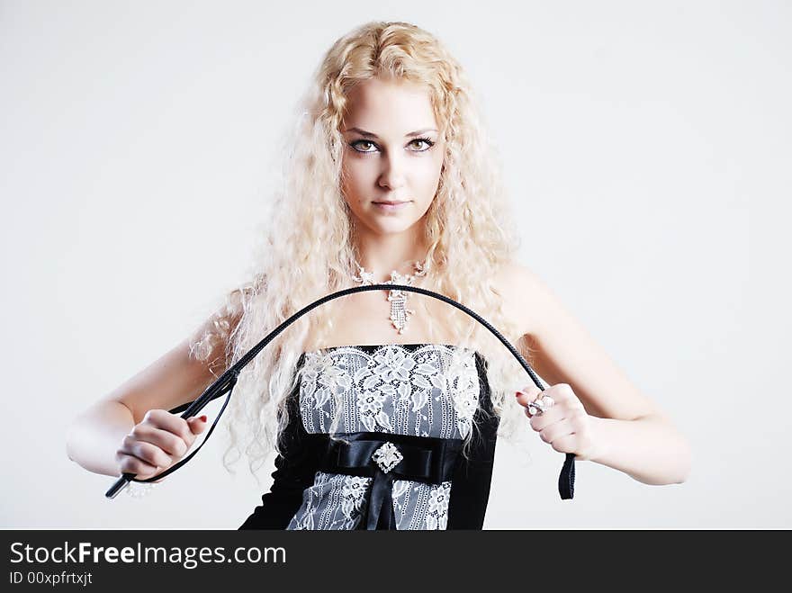 The young girl shows the force bending a switch. The young girl shows the force bending a switch