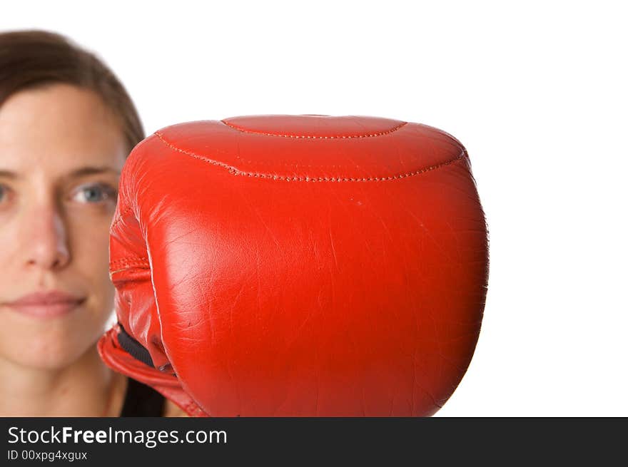 Woman in gym clothes, with boxing gloves, strength