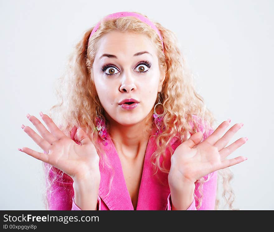 The surprised girl dressed in pink