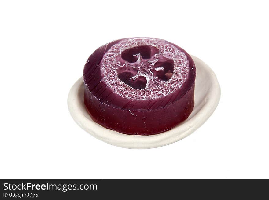 Fragrant soap on a wooden shelf