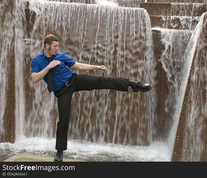 Moving meditation in front of a waterfall. Moving meditation in front of a waterfall