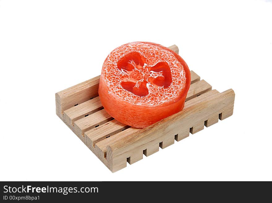 Fragrant soap on a wooden shelf