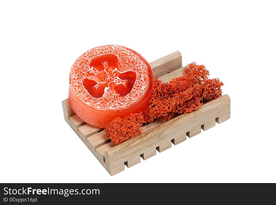 Fragrant soap on a wooden shelf