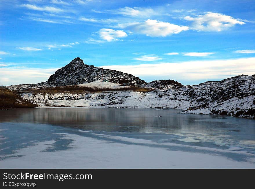 A view of a snow covered pond at the Arunachal prades. A view of a snow covered pond at the Arunachal prades.