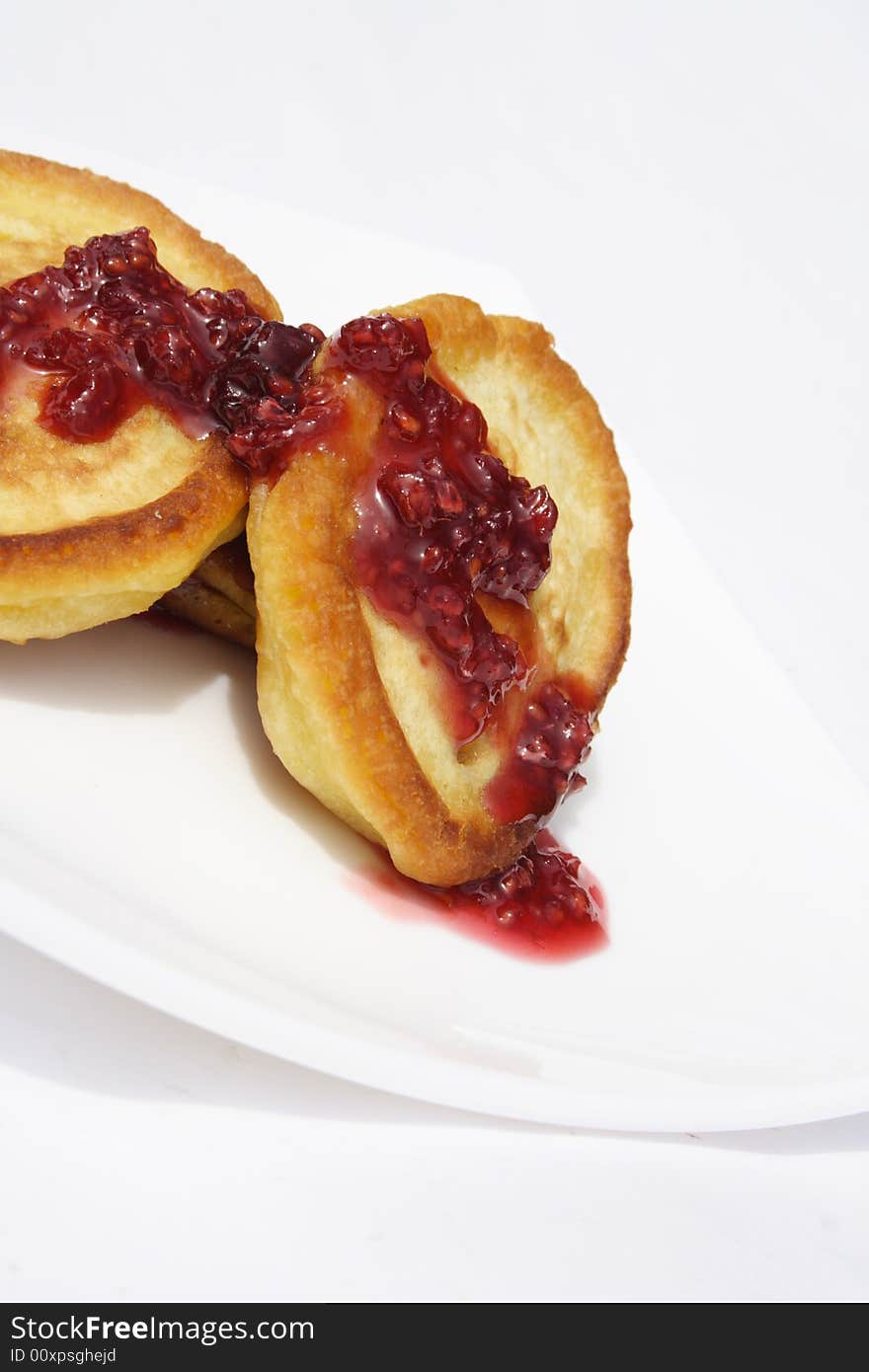 Pancakes with jam on plate