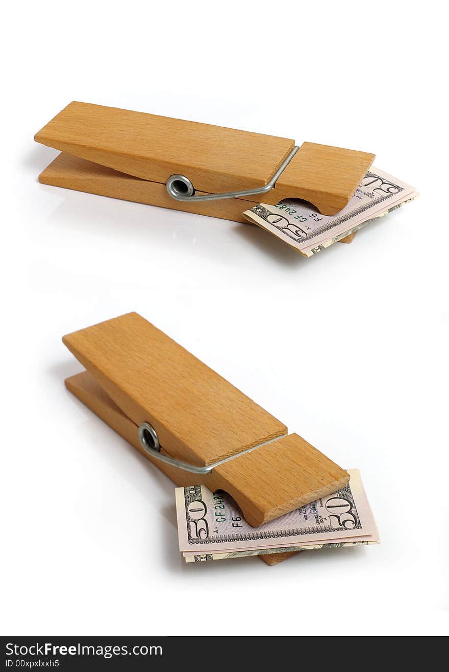 Wooden clothespin and fifty dollars. Wooden clothespin and fifty dollars