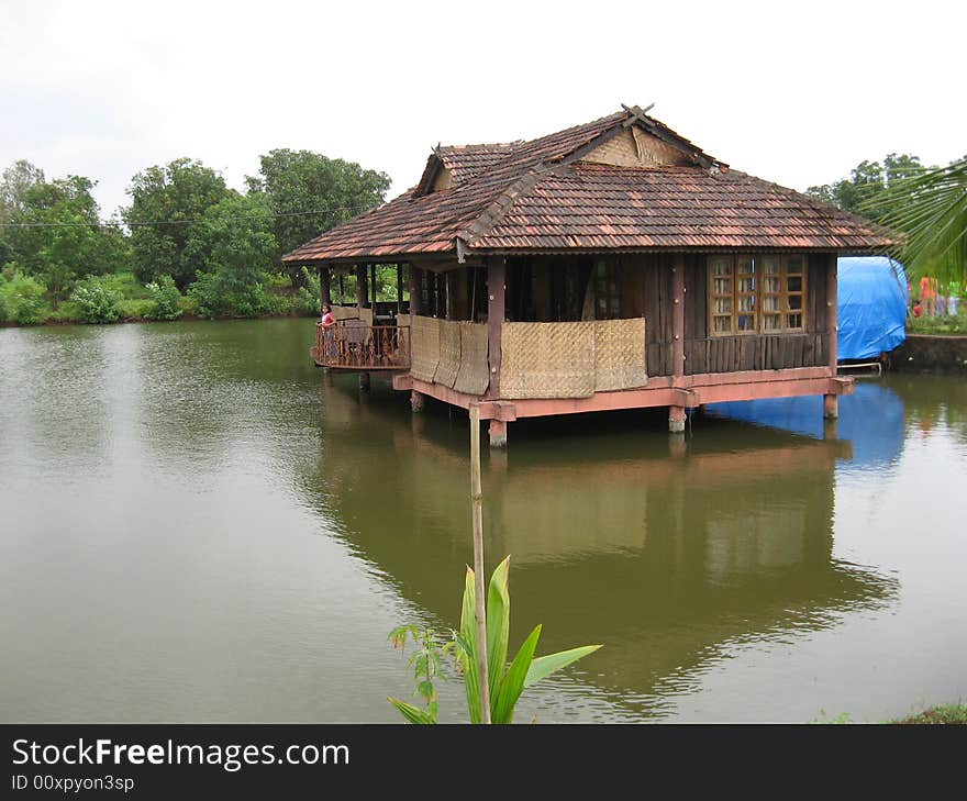 It is a lovely pond house anyone will love to stay in. Actually it is meant for Reosrt in Maharashtra , india.