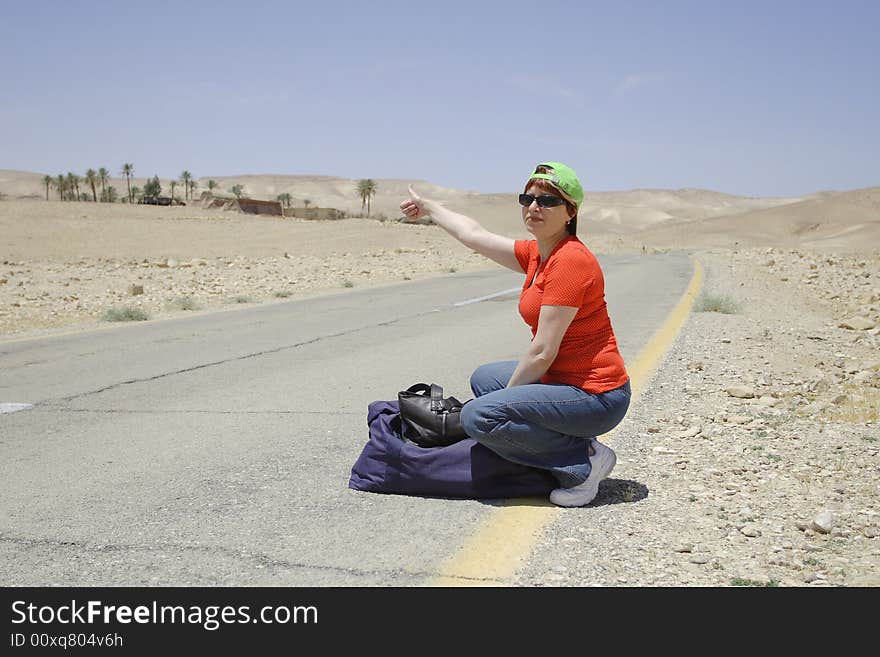 Hitchhiking woman