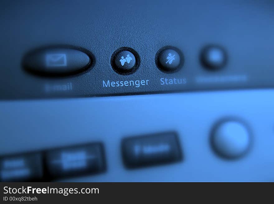 Messenger button on a computer keyboard. Photo has a soft focus with a blue nuance.