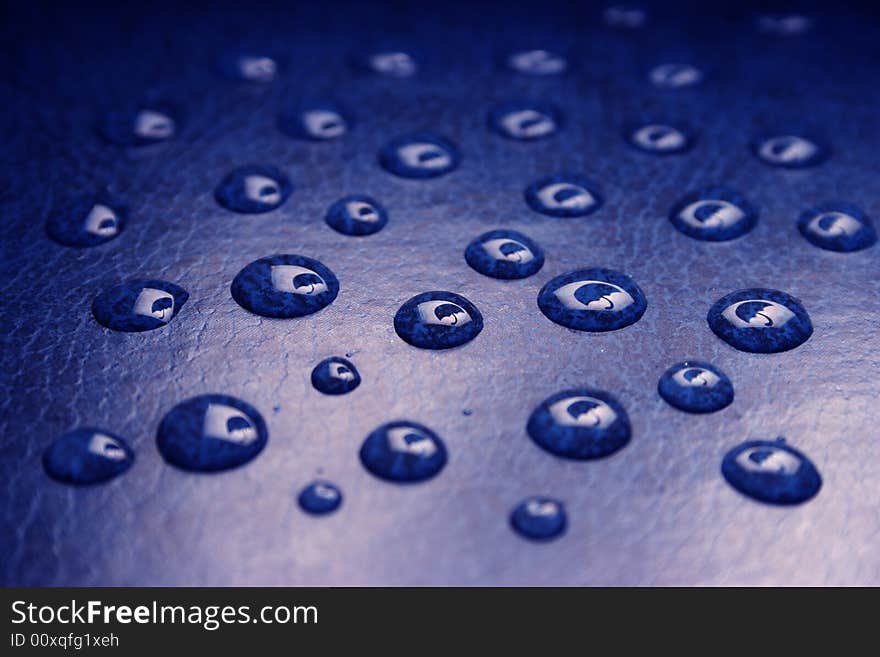 Drops of water on a cover to the book. Drops of water on a cover to the book