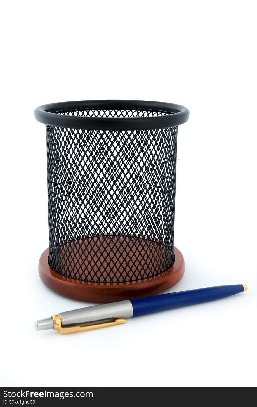 Office black basket with a pen. Office black basket with a pen