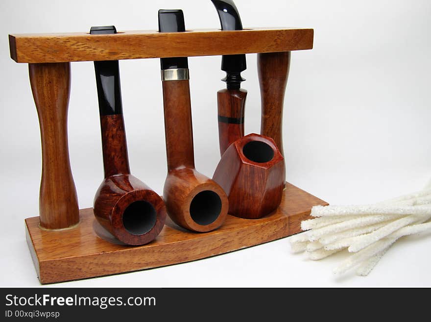 Three tobacco pipes isolated on white.