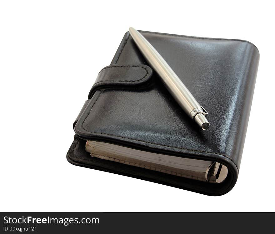 Black notebook with a pencil